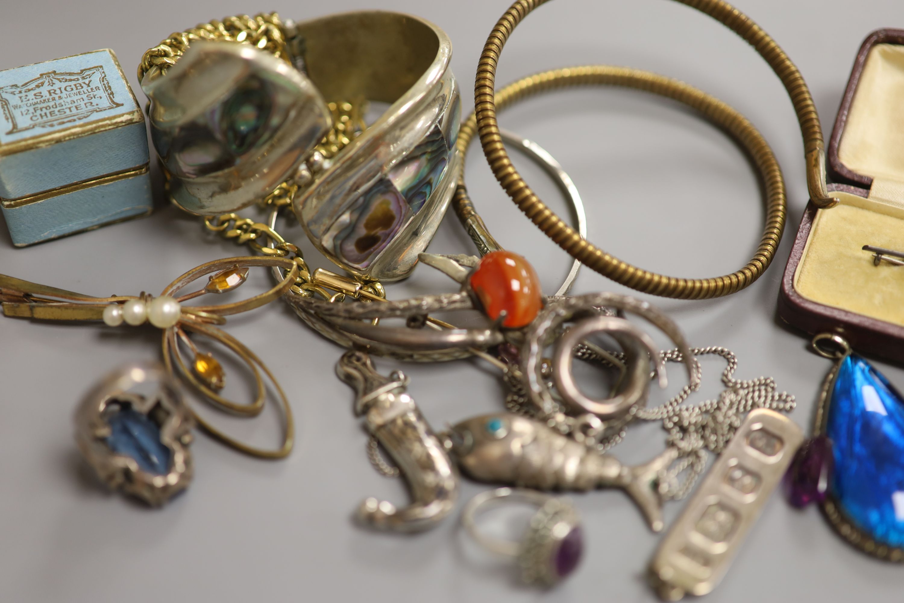 Assorted jewellery including silver pendant and costume.